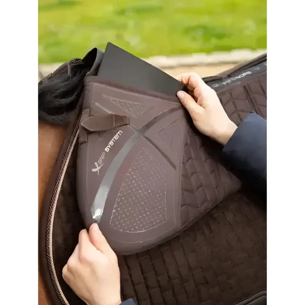 Dark brown lemieux prosorb plain pocket quilted half pad with textured design and x-system logo visible on side