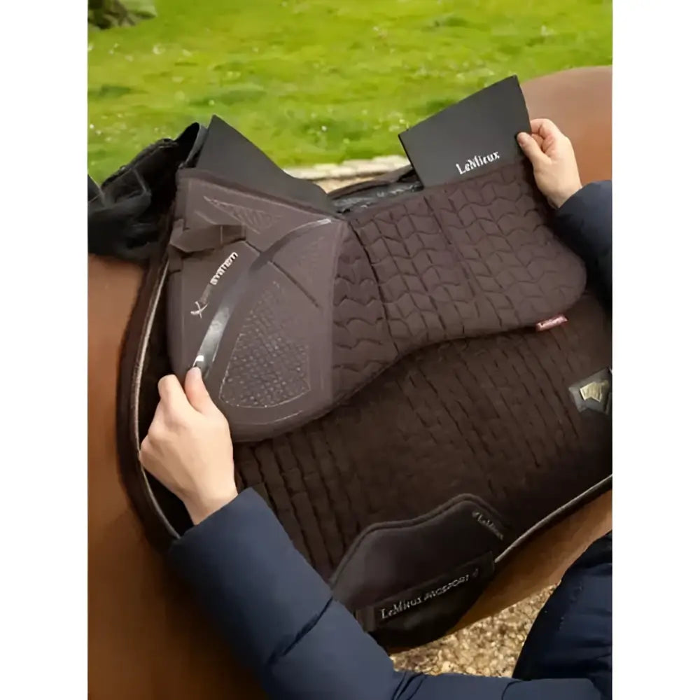 Dark brown lemieux prosorb plain pocket quilted half pad with quilted texture and reinforced edges for comfort