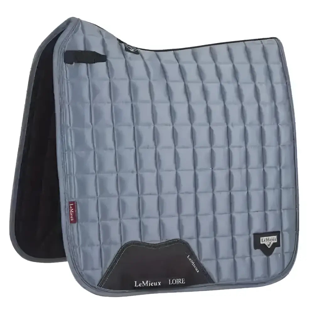Gray quilted lemieux prosport loire classic dressage square saddle pad with black trim and branded logo patch