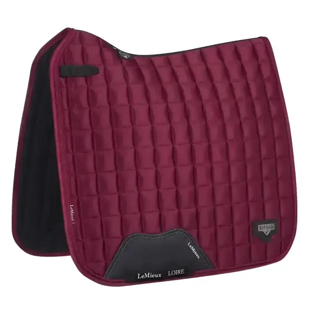 Maroon quilted lemieux prosport loire classic dressage square saddle pad with black trim and branded patch