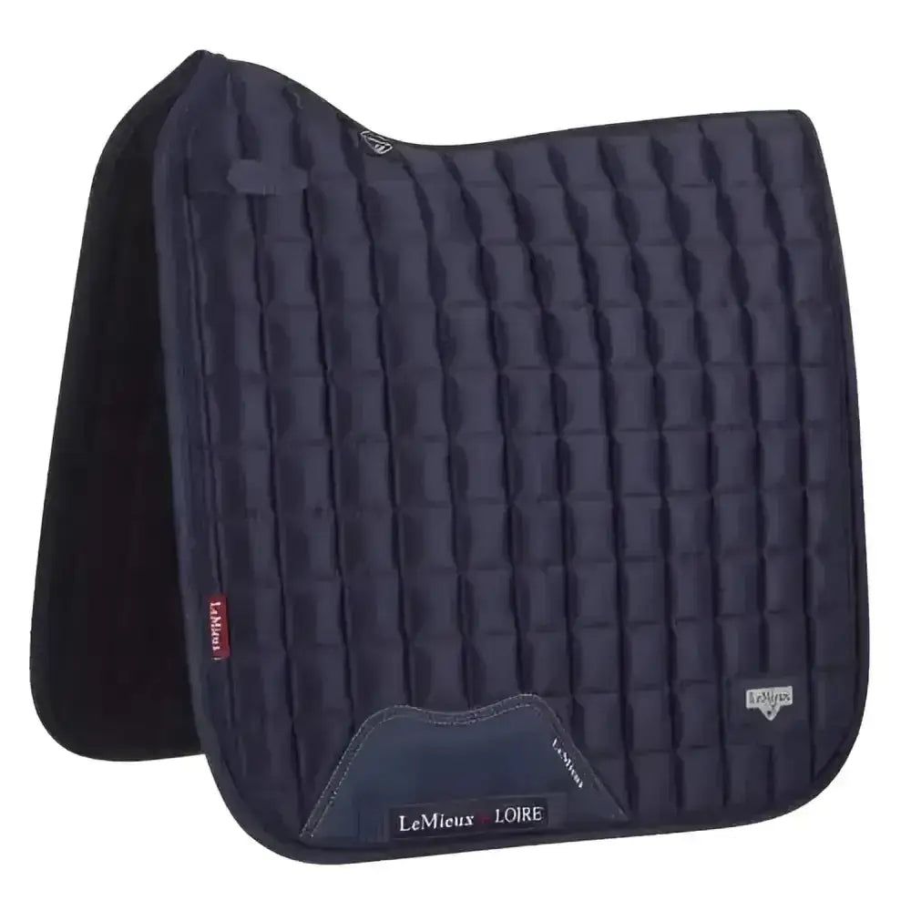 Dark navy blue quilted lemieux prosport loire classic dressage square saddle pad with geometric pattern and black trim