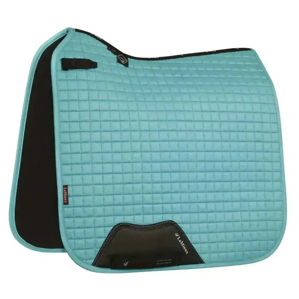 A teal lemieux prosport suede dressage square azure with soft suede binding black trim and branded logo patch