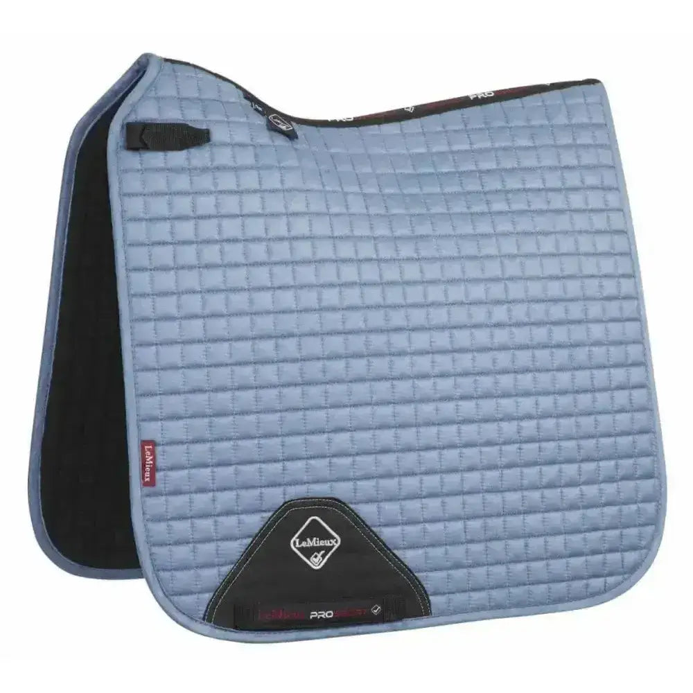 Light blue lemieux prosport suede dressage square with black trim and diamond logo patch for dressage use