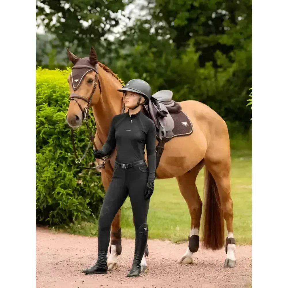 Black riding outfit with long sleeves and full-length leggings for equestrian use featuring lemieux puissance fly hood brown