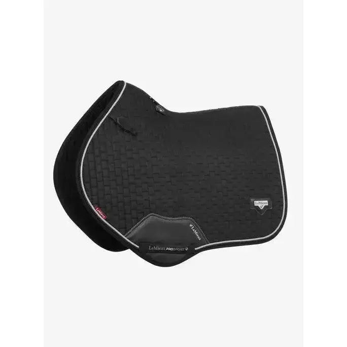 Black lemieux puissance suede close contact square saddle pad with textured surface white stitching and logo patch