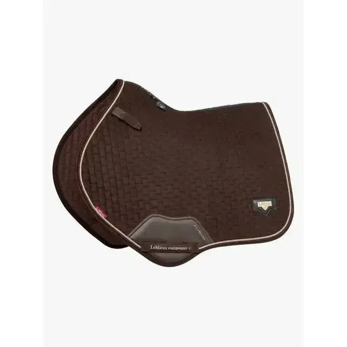 Brown lemieux puissance suede close contact square saddle pad with textured woven surface and white stitched edges