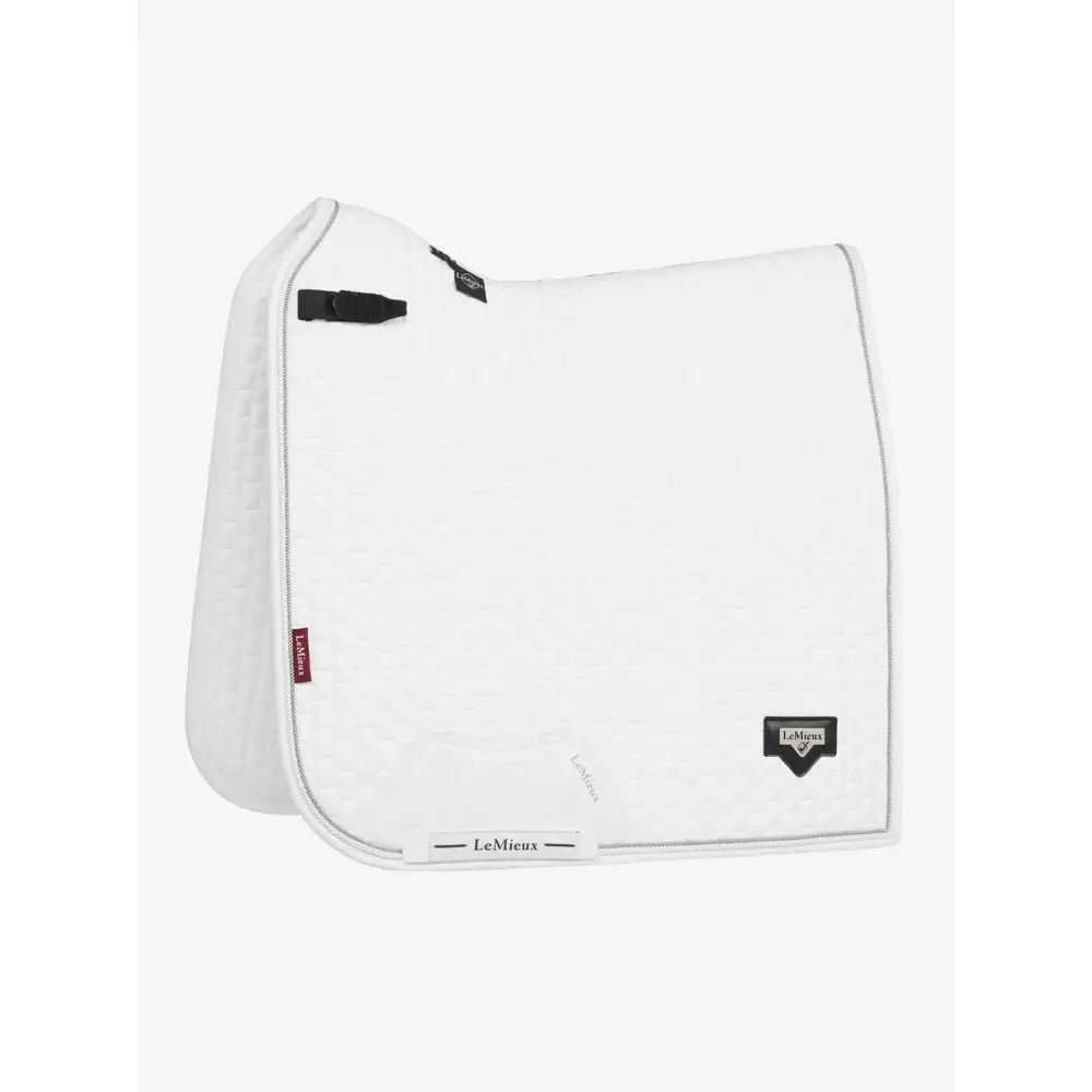 White lemieux puissance suede dressage pad in suede with black trim and brand logos perfect for dressage use