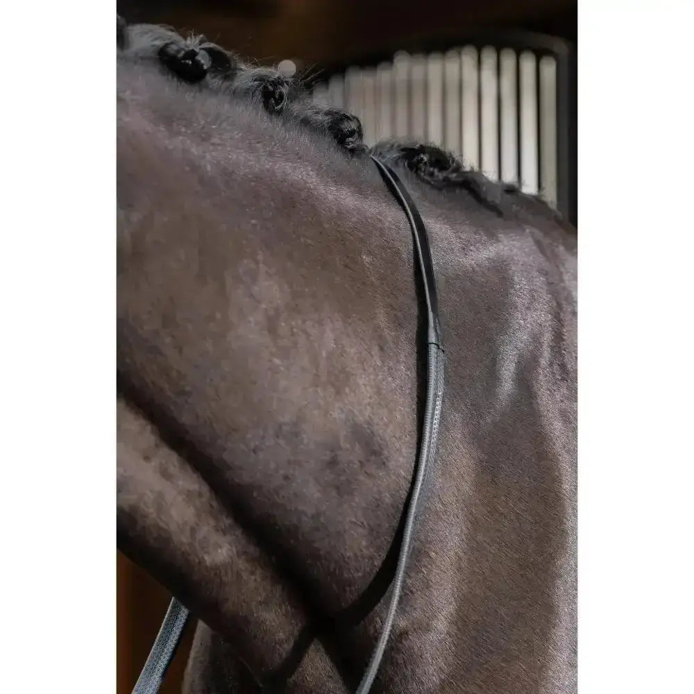 Black leather horse bridle strap with reinforced stitching for lemieux rubber reins offering a light grip feel and practical reins