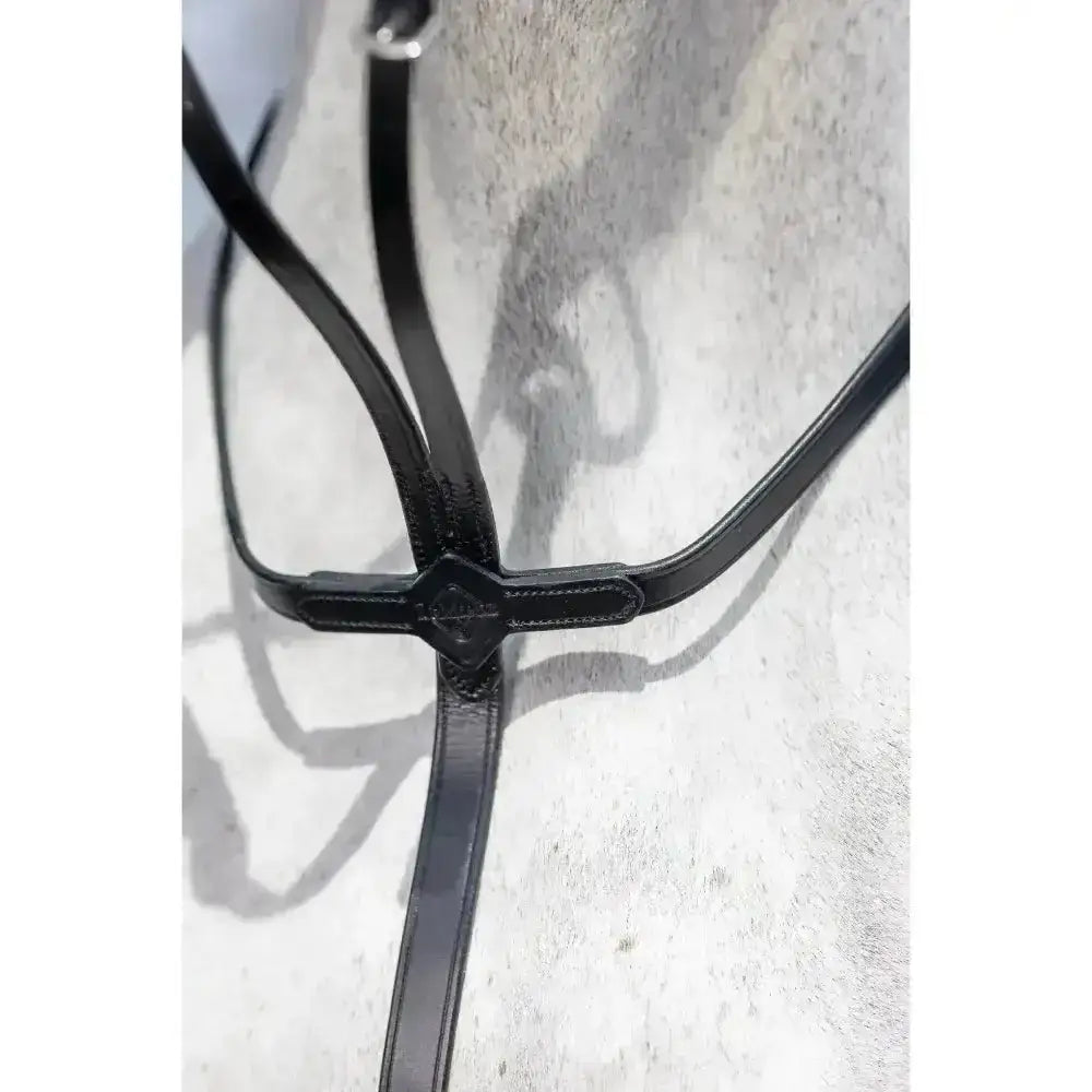 Black leather lemieux running martingale with central diamond-shaped buckle and adjustable neck strap for riding