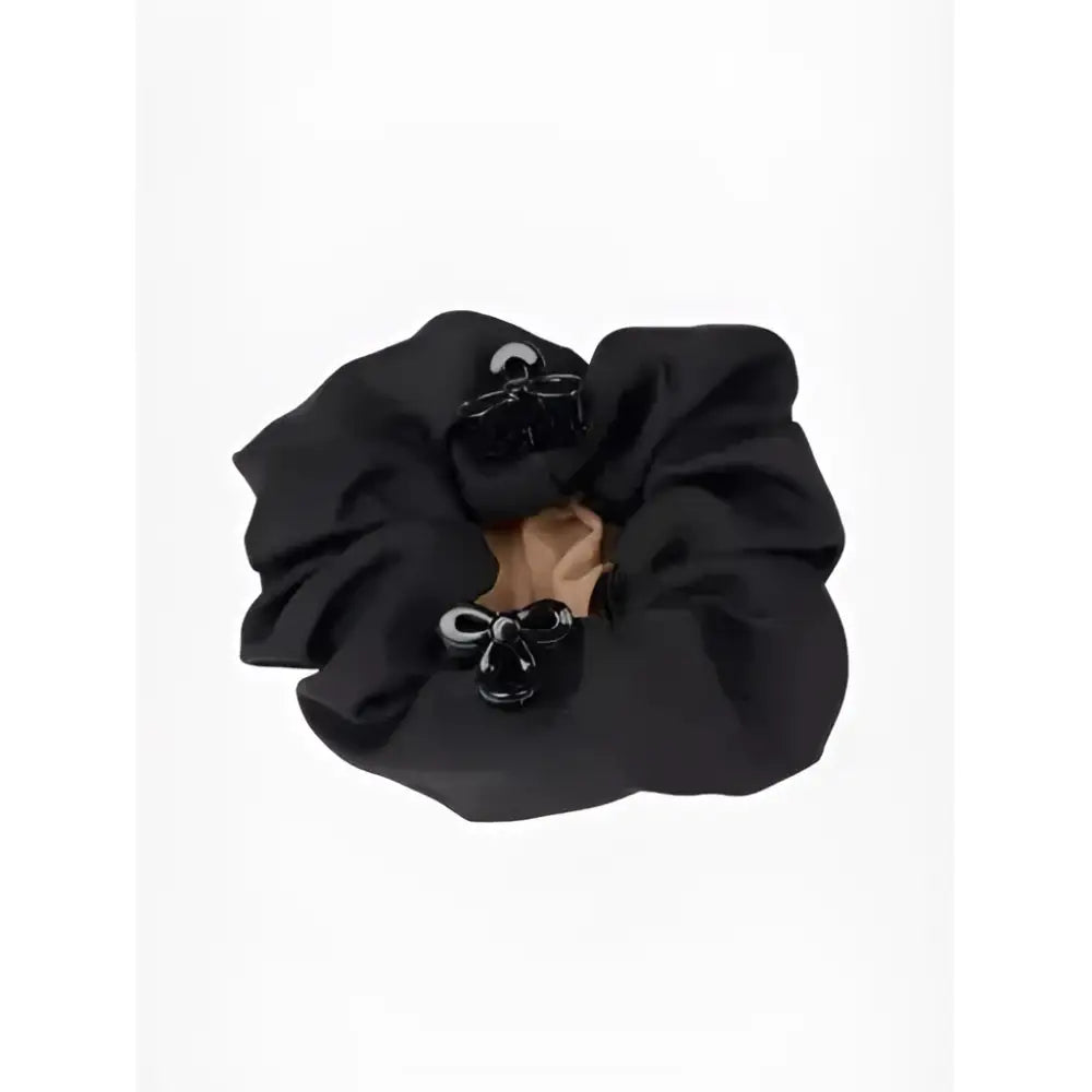 Black satin lemieux scrunchie with two glossy bow clips featuring a crystal hair net in black blonde color