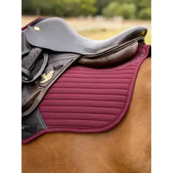 Maroon lemieux soft shell anti slip close contact square burgundy saddle pad with vertical stitching and black leather trim