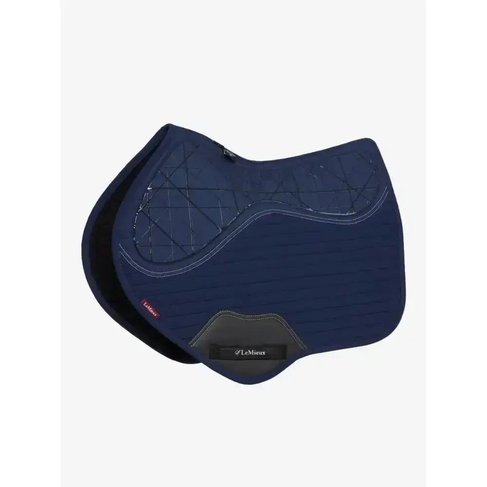 Navy blue lemieux soft shell anti slip close contact square saddle pad with black trim and lemieux label