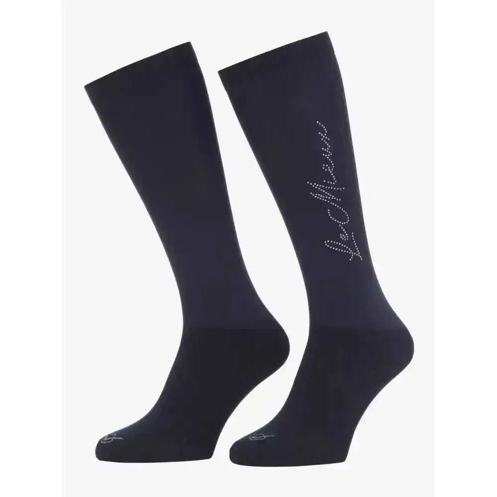 Black knee-high sparkle competition sock with navy le coq sportif logo in rhinestones for close contact competition
