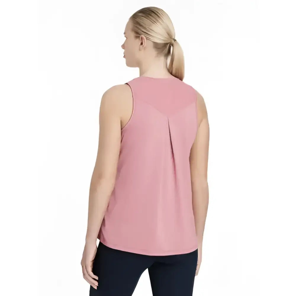 A soft pink lemieux sports vest peony with a subtle pleated back detail perfect for active days