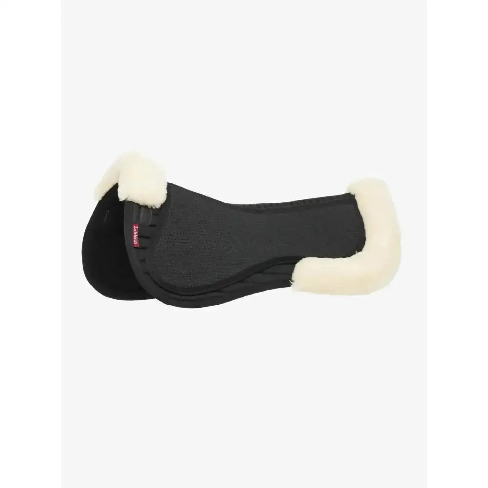 Black lemieux streamline half pad with cream fleece trim and red loket tag for saddle fit in black natural