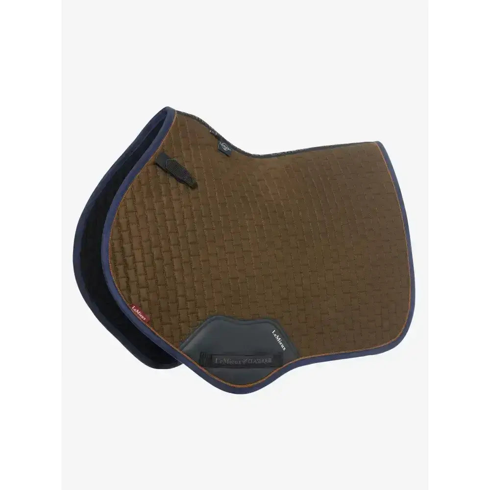 Brown quilted suede close contact saddle pad with navy edges and lemieux leather patch from contact square alpine