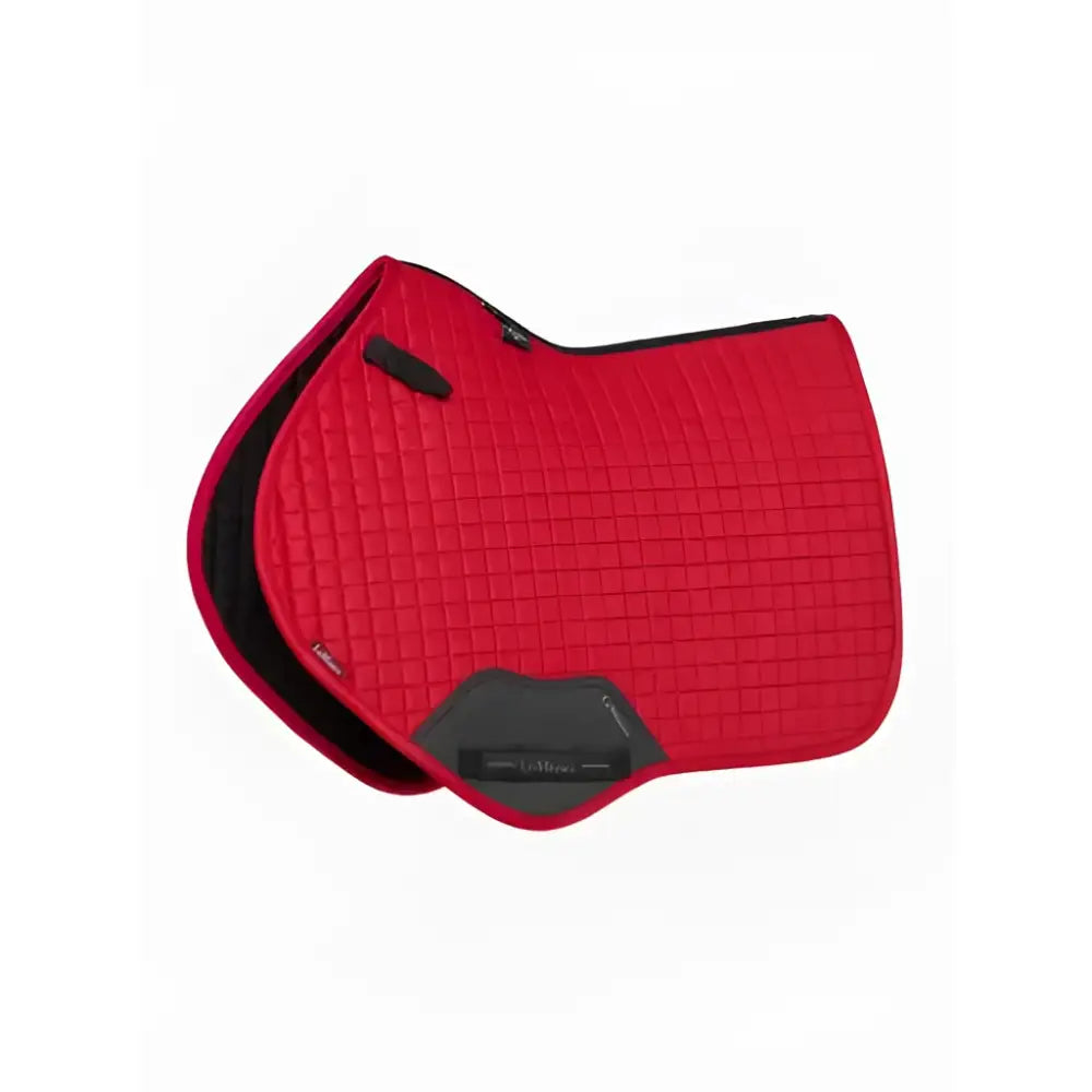 Red quilted lemieux suede close contact square chilli saddle pad with black trim and branded label