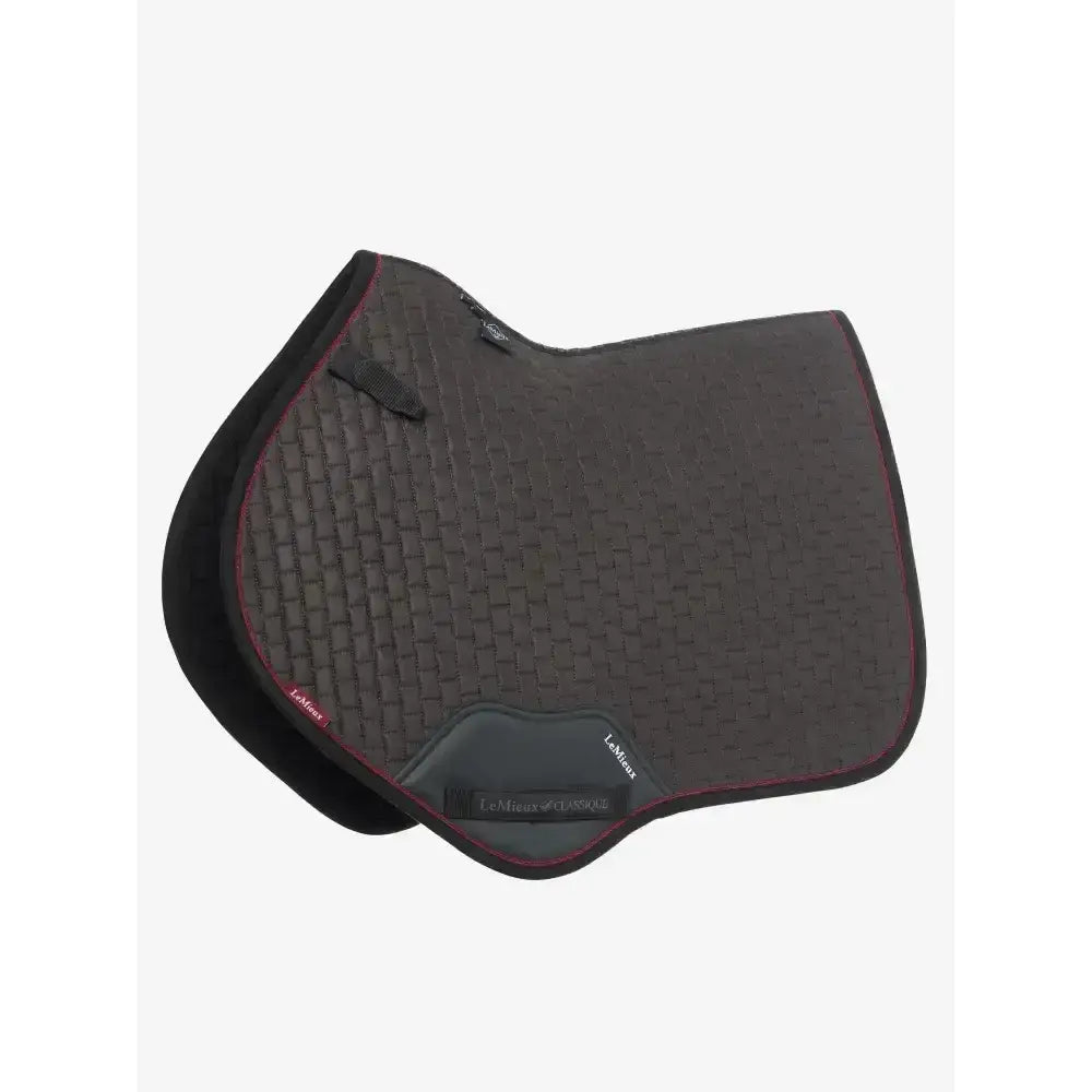 Black lemieux suede close contact saddle pad with woven texture red piping and branded label contact square cinder