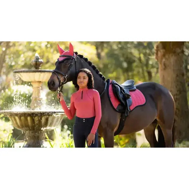 Pink quilted lemieux suede gp square saddle pad in cranberry perfect for dressage and jumping