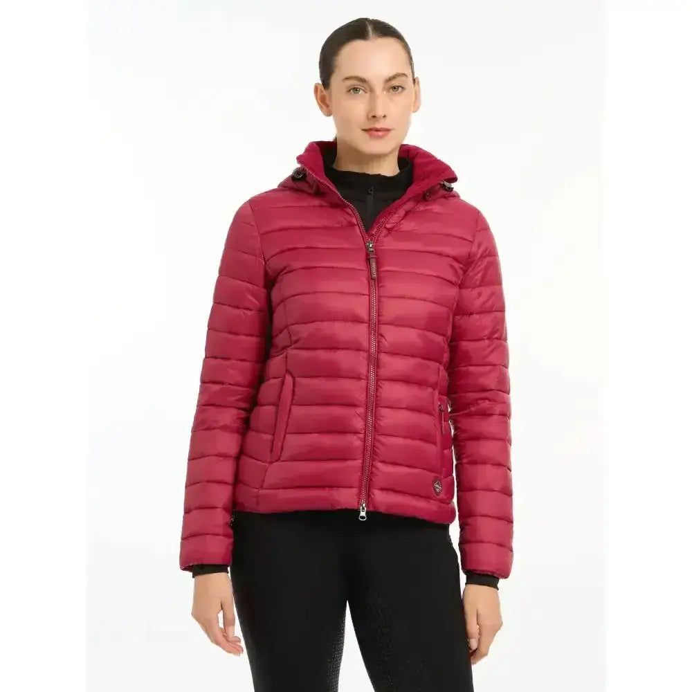 A vibrant fuchsia lemieux tilly hooded puffer jacket ember with quilted design and front zipper perfect for cold days