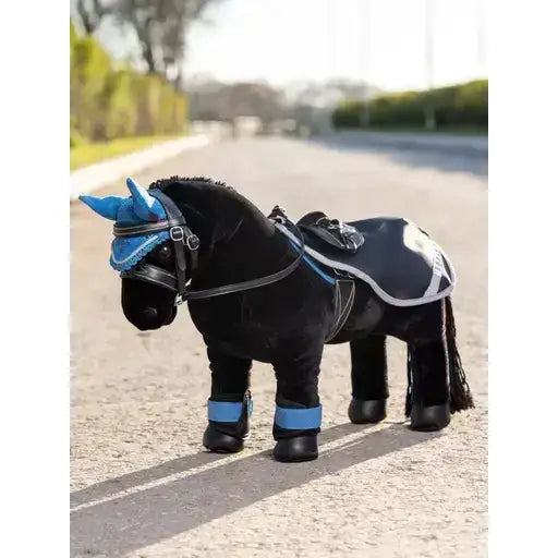 Black plush lemieux toy pony with blue accents wearing a navy pony exercise sheet and matching saddle and bridle