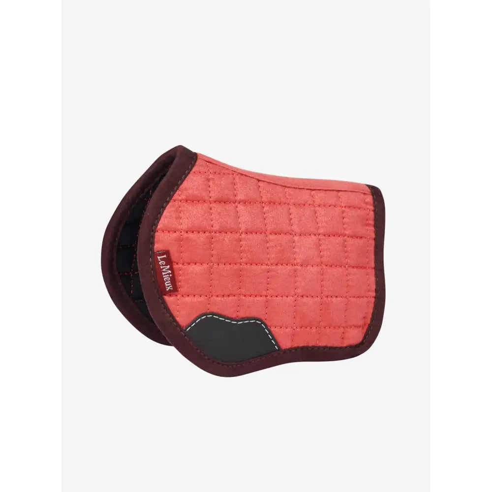 Coral-colored lemieux toy pony saddle pad cranberry with quilted design dark brown trim and black reinforced patch