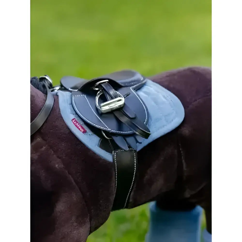 Dark blue quilted lemieux toy pony saddle pad ice blue with silver buckle black leather straps and red lambskin label