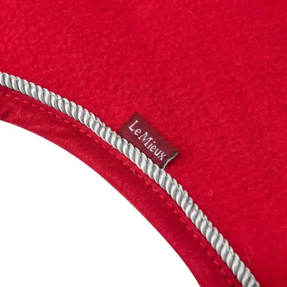 Red felt lemieux toy pony hat with silver twisted cord trim and lemieux brand label in chilli pony rug color