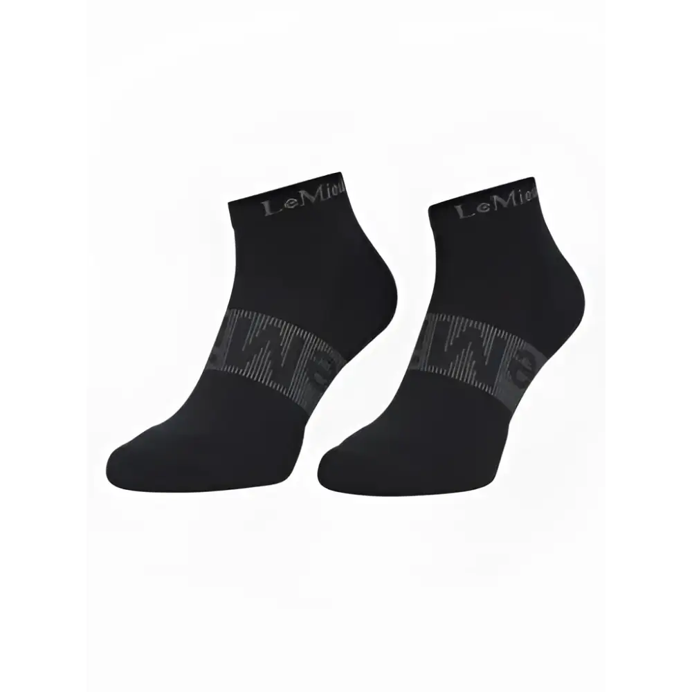 Black lemieux trainer socks with subtle gray logo and patterned foot design perfect for training and casual wear