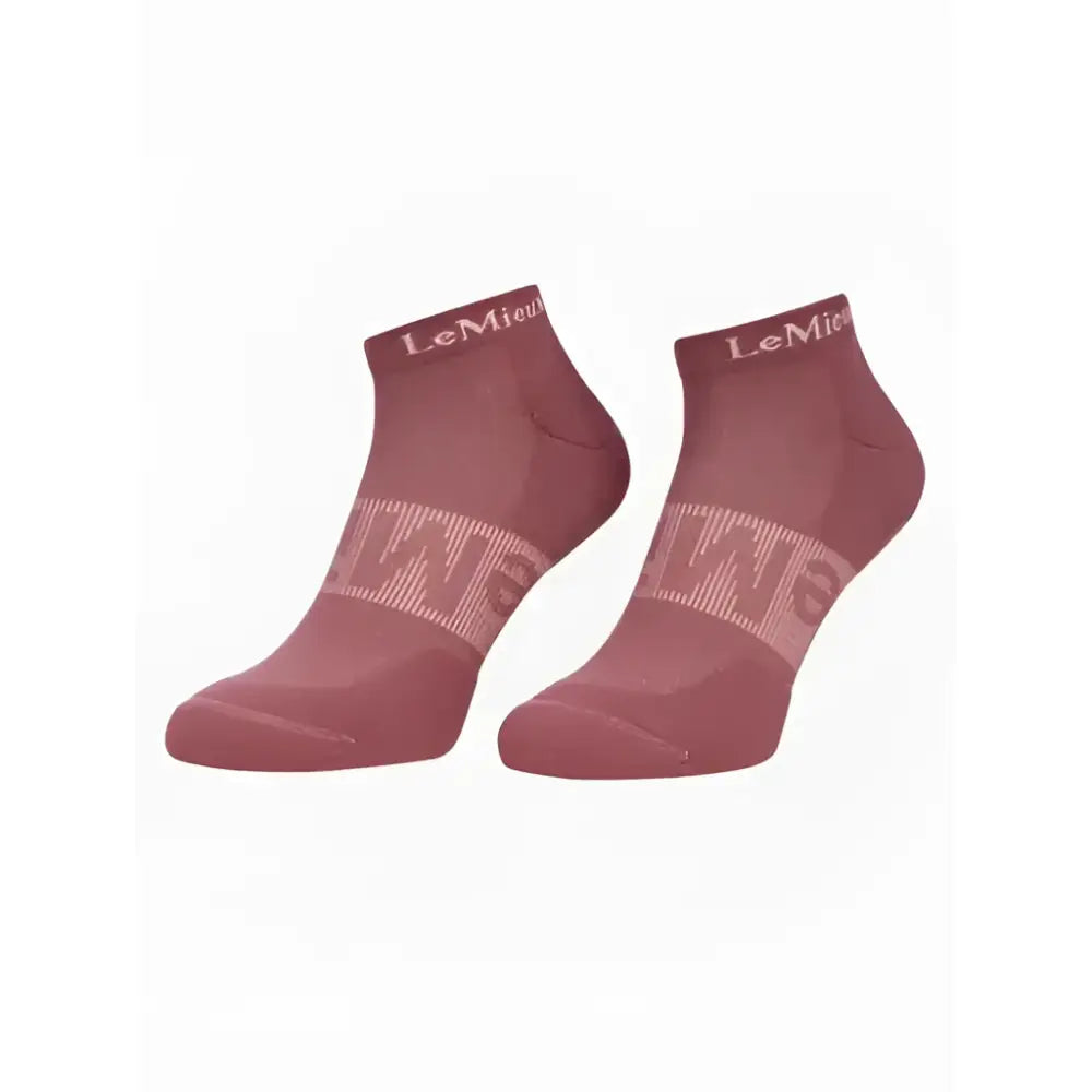 A pair of dusty rose lemieux trainer socks with subtle texture and brand logo from the pack rosewood dusk aqua