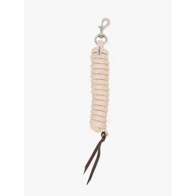 Beige lemieux training leadrope blossom stone with coiled rope, silver clasp, and dark brown leather tassels keychain