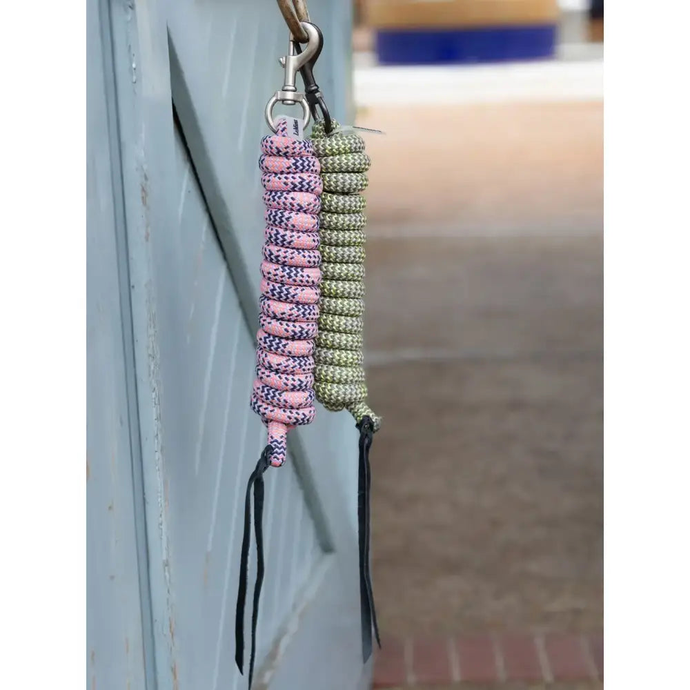 Pink and olive green braided rope halters with black tassels from lemieux training leadrope rosemary stone lemonade collection