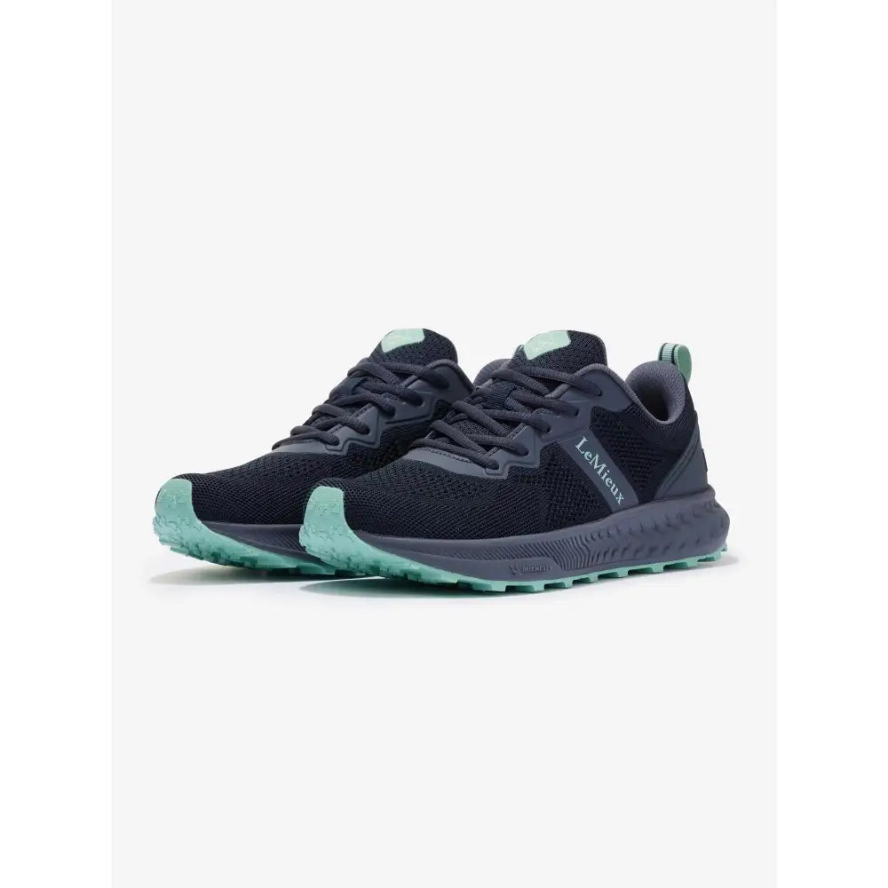 Black and teal LeMieux Trax-Lite trainer dusk shoes with breathable mesh upper and rugged outsole perfect for equestrian use