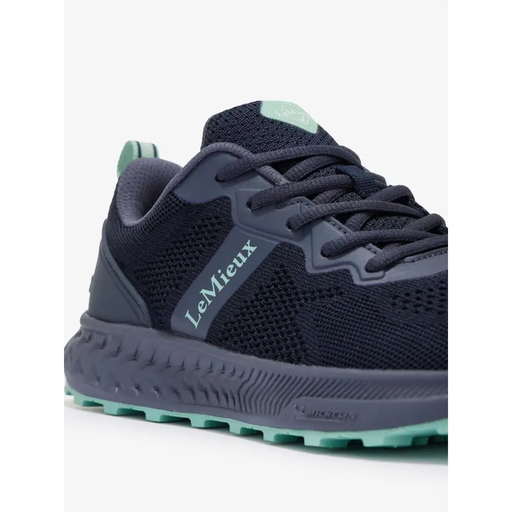 Dark navy mesh trainer dusk running shoe by lemieux with gray accents and mint green sole for equestrian use