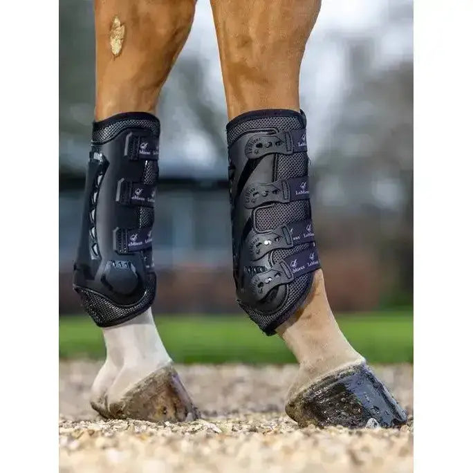 Black LeMieux ultra mesh snug boots hind with mesh panels and adjustable straps for horse leg protection