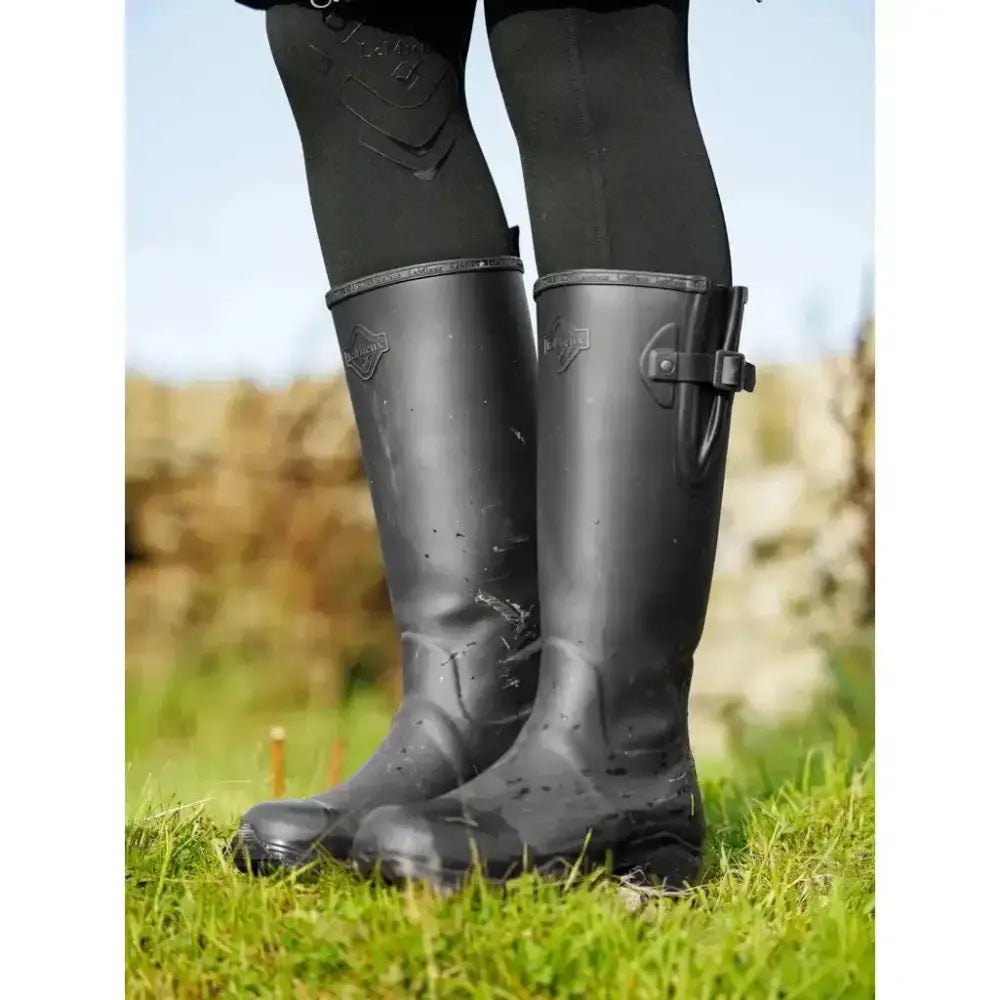 Black rubber lemieux ultra stride wellington boots with side buckle and embossed logo for riding use