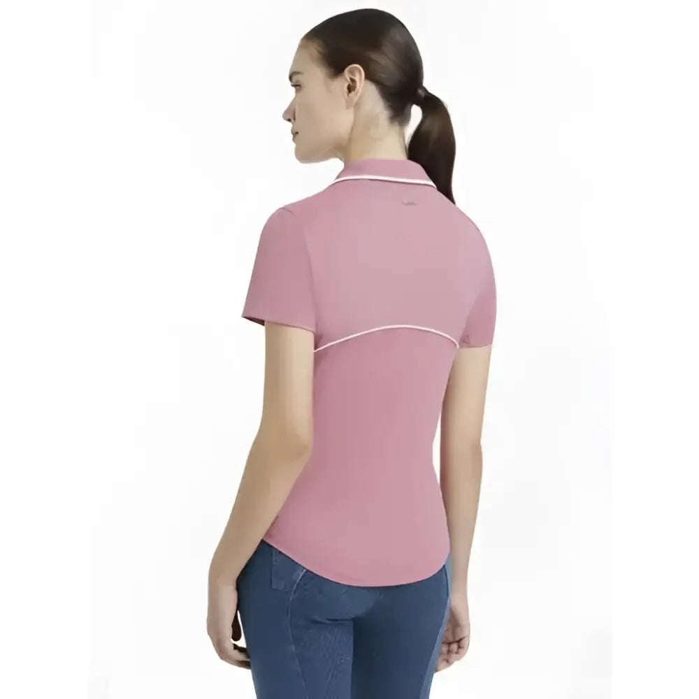 Pink lemieux venus performance polo with white trim on collar and underarm seam perfect for active wear
