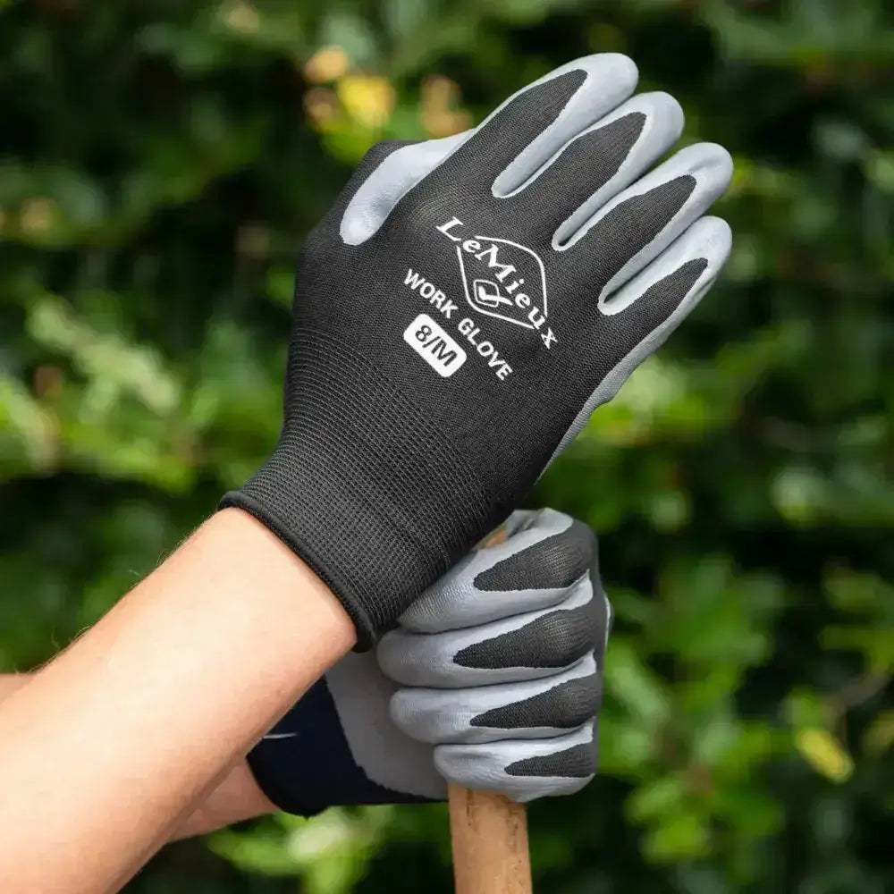 Black and gray lemieux work gloves with textured grip panels providing excellent flexibility for hard working hands