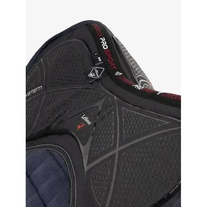 Black and navy blue lemieux x-grip silicone dressage square with textured grip panels for secure riding