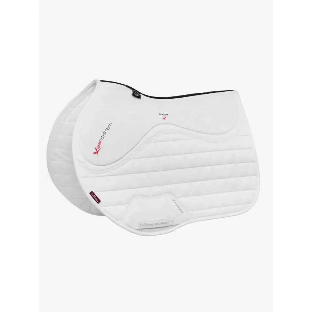 White quilted horse saddle pad with black trim red branding featuring iconic lemieux cut and unique blast foam for stability