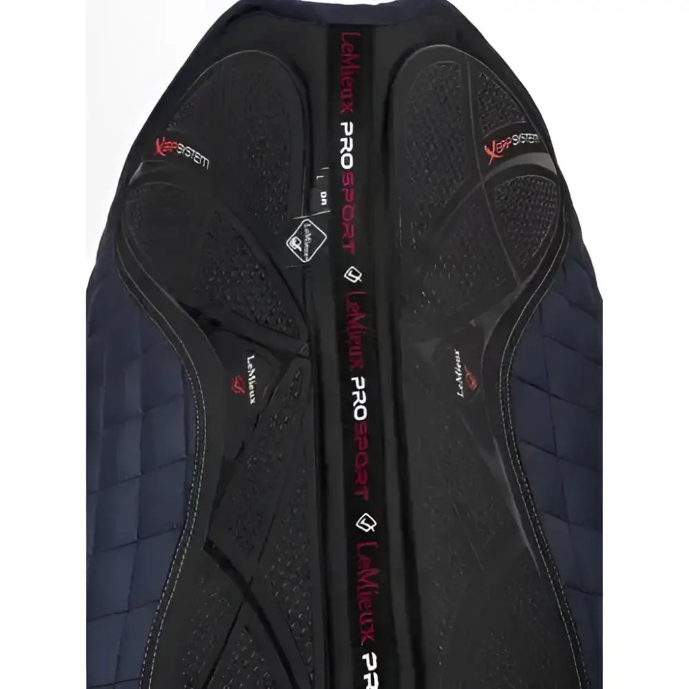 Black quilted dressage square navy saddle pad with twin sided x-grip textured rubber inserts and red acavallo gel branding