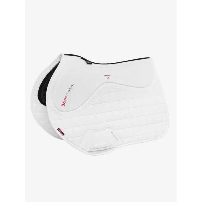 White quilted horse saddle pad with black trim and pink scott brash branding featuring x-grip silicone twin sided eurojump design