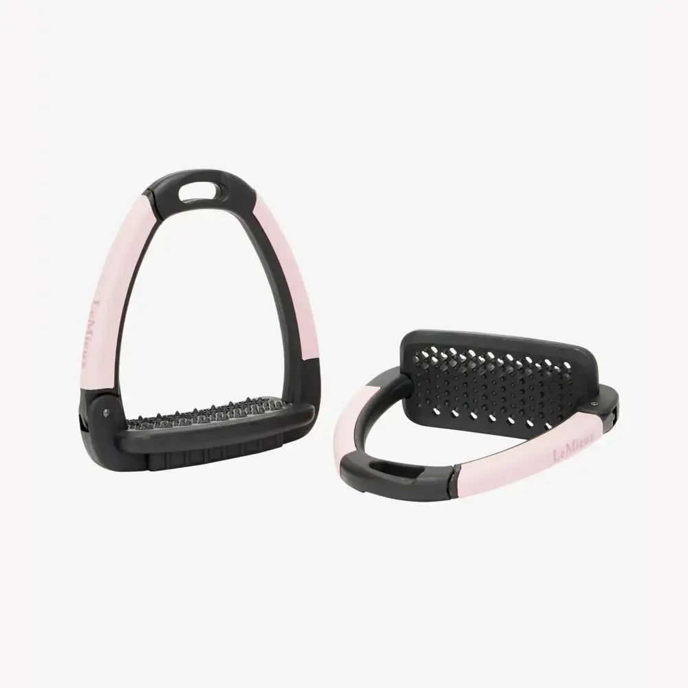 Pink and black lemieux x horsena swap stirrup blossom with textured perforated design for equestrian riding