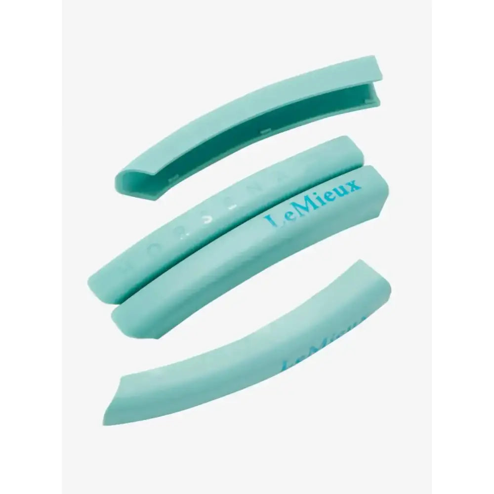 Light teal silicone lemieux x horsena swap stirrup arm covers with smooth matte finish and embossed branding