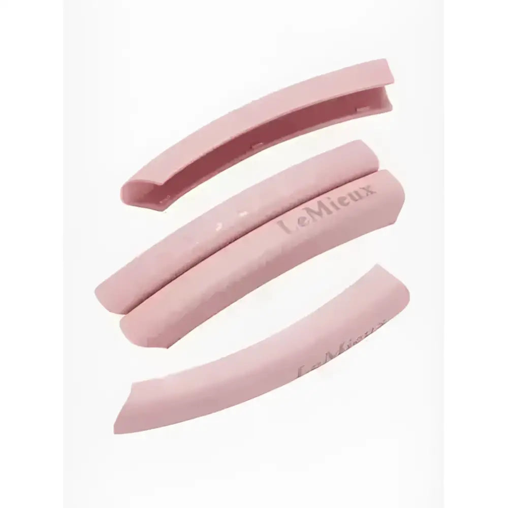Pink silicone horsena swap stirrup arm covers blossom with textured diamond pattern and lemieux branding