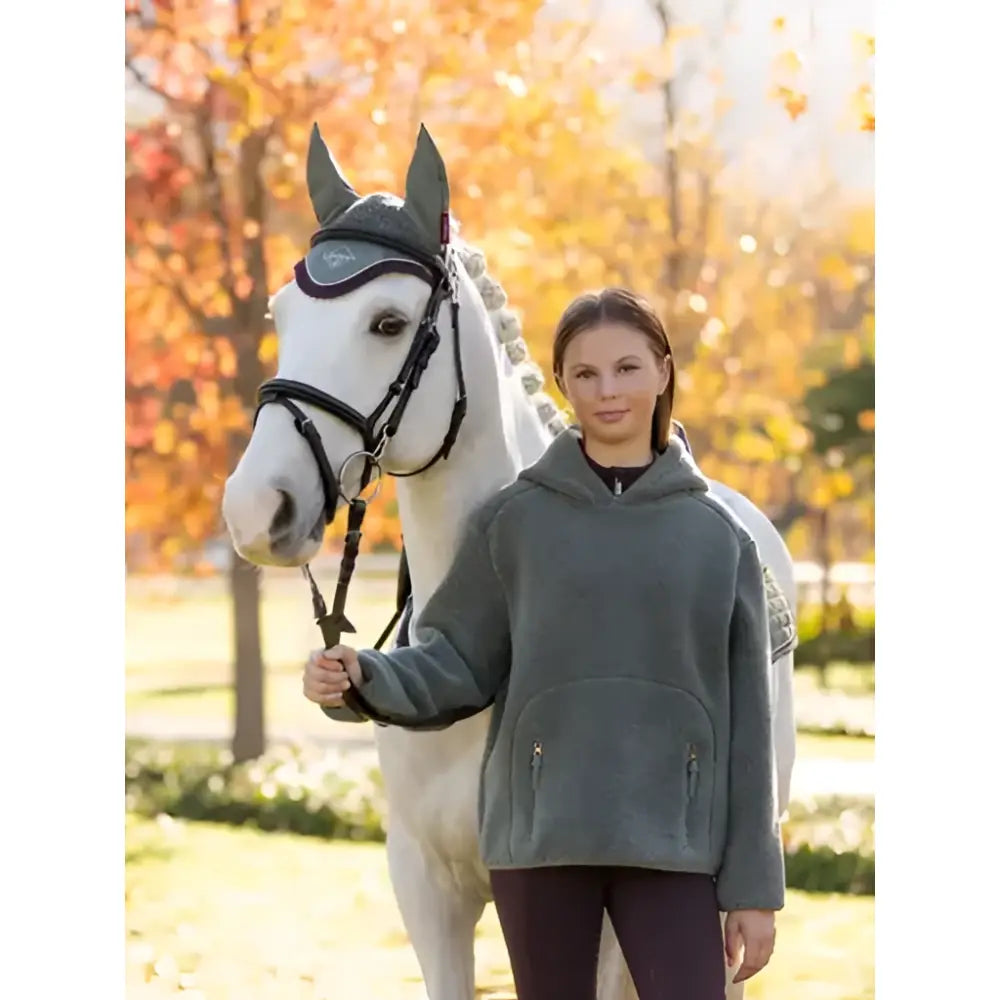 Gray fleece hoodie with front pockets and zippered details from lemieux young rider avalon hoodie rosemary collection