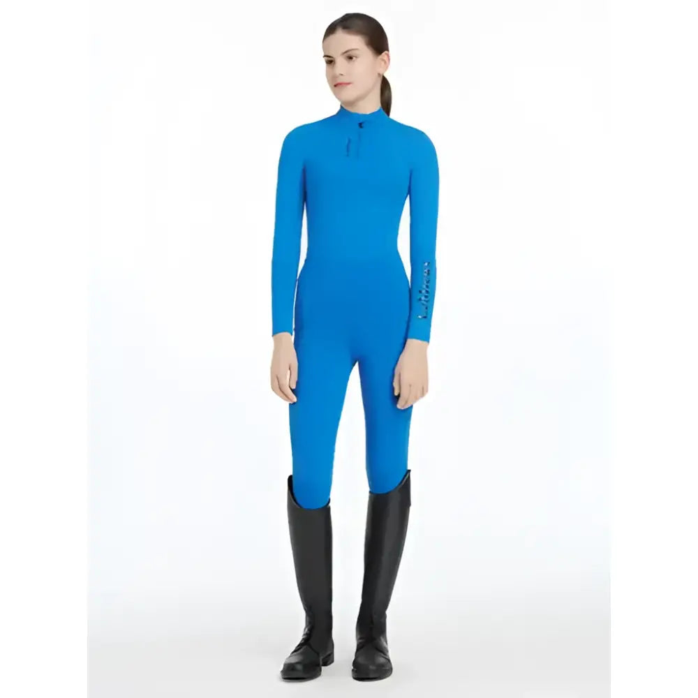 Bright blue lemieux young rider form fitting base layer with high collar and subtle stitching in benetton layer blue