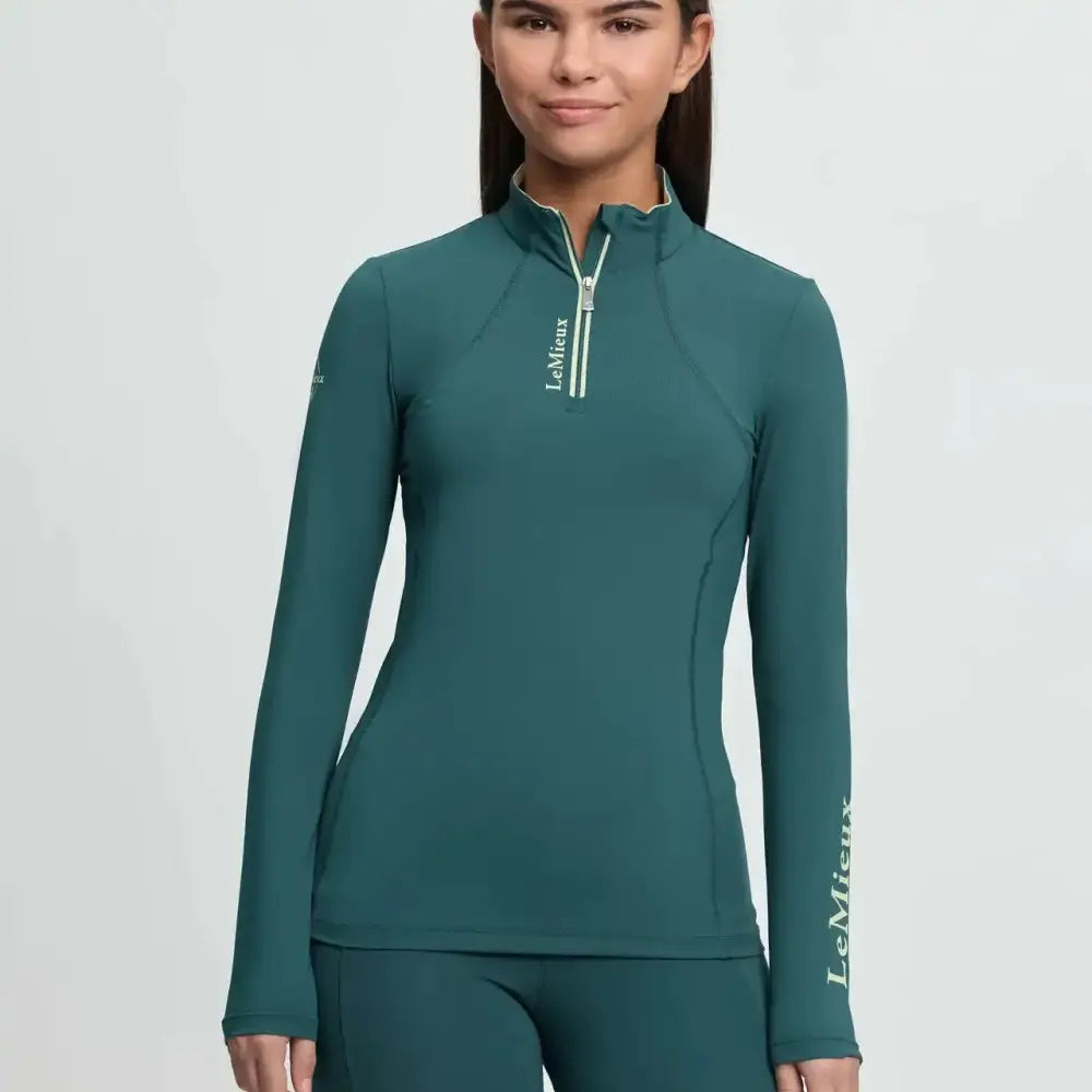 Teal lemieux young rider jungle base layer classic rider top with white zipper and logo on chest and sleeve