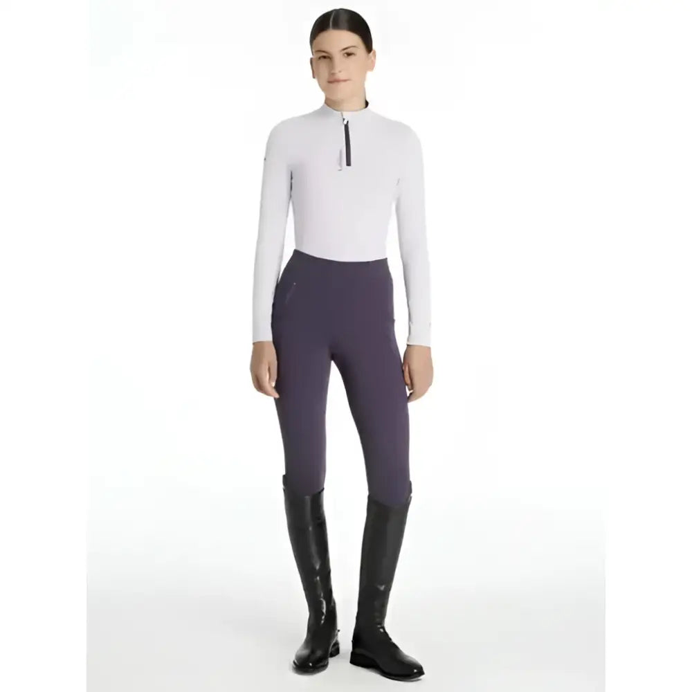 White long-sleeved lemieux young rider classique top with black zipper and subtle chest logo layer lilac style