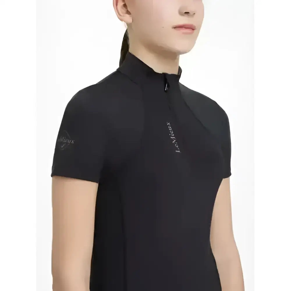 Black short sleeve performance base layer with high collar zipper and embroidered branding lemieux young rider classic